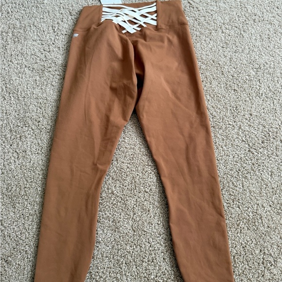 Fabletics Kids Tan Leggings with Crisscross Accent - Picture 1 of 7